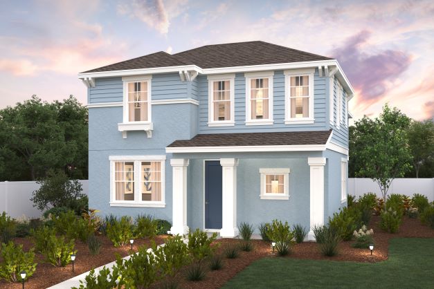 A blue house with a garden.