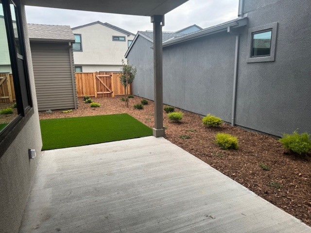 A driveway between two buildings.