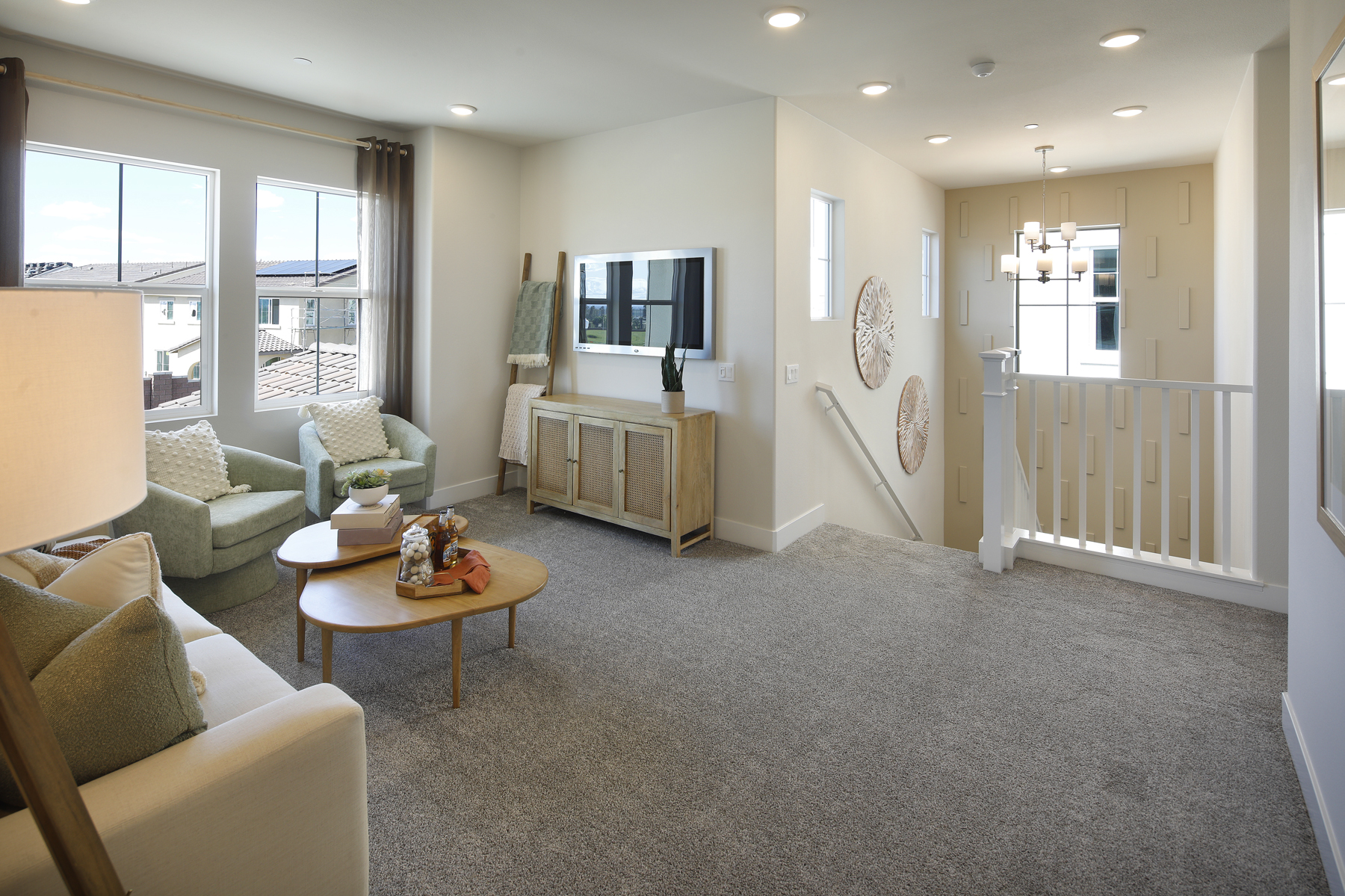 A living room with a tv and couches.