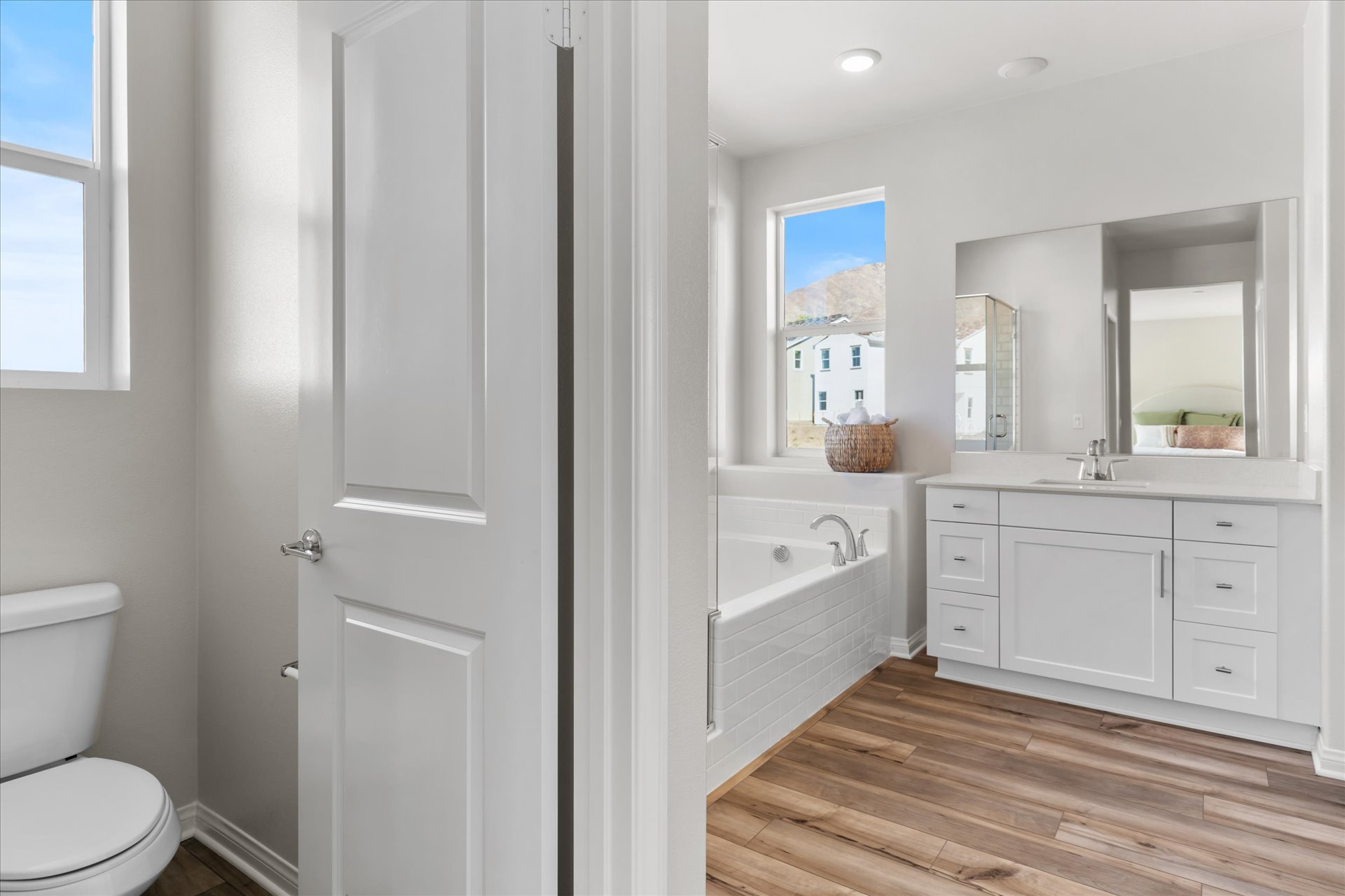 A bathroom with a tub toilet and sink.