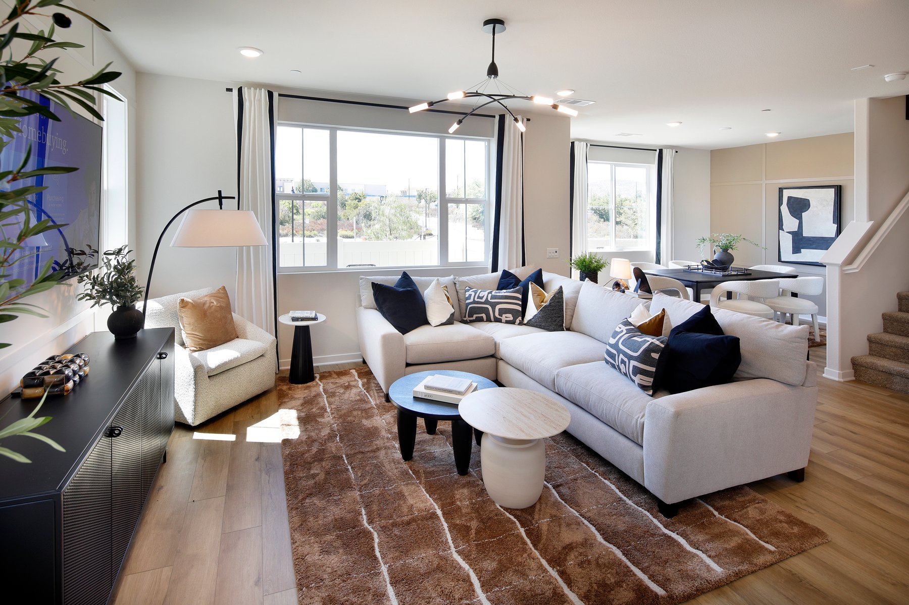 A living room with a large window.