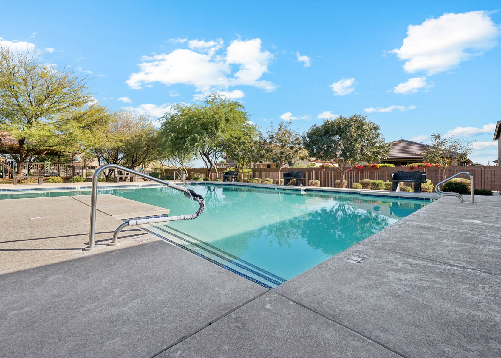 A pool with a slide in it.