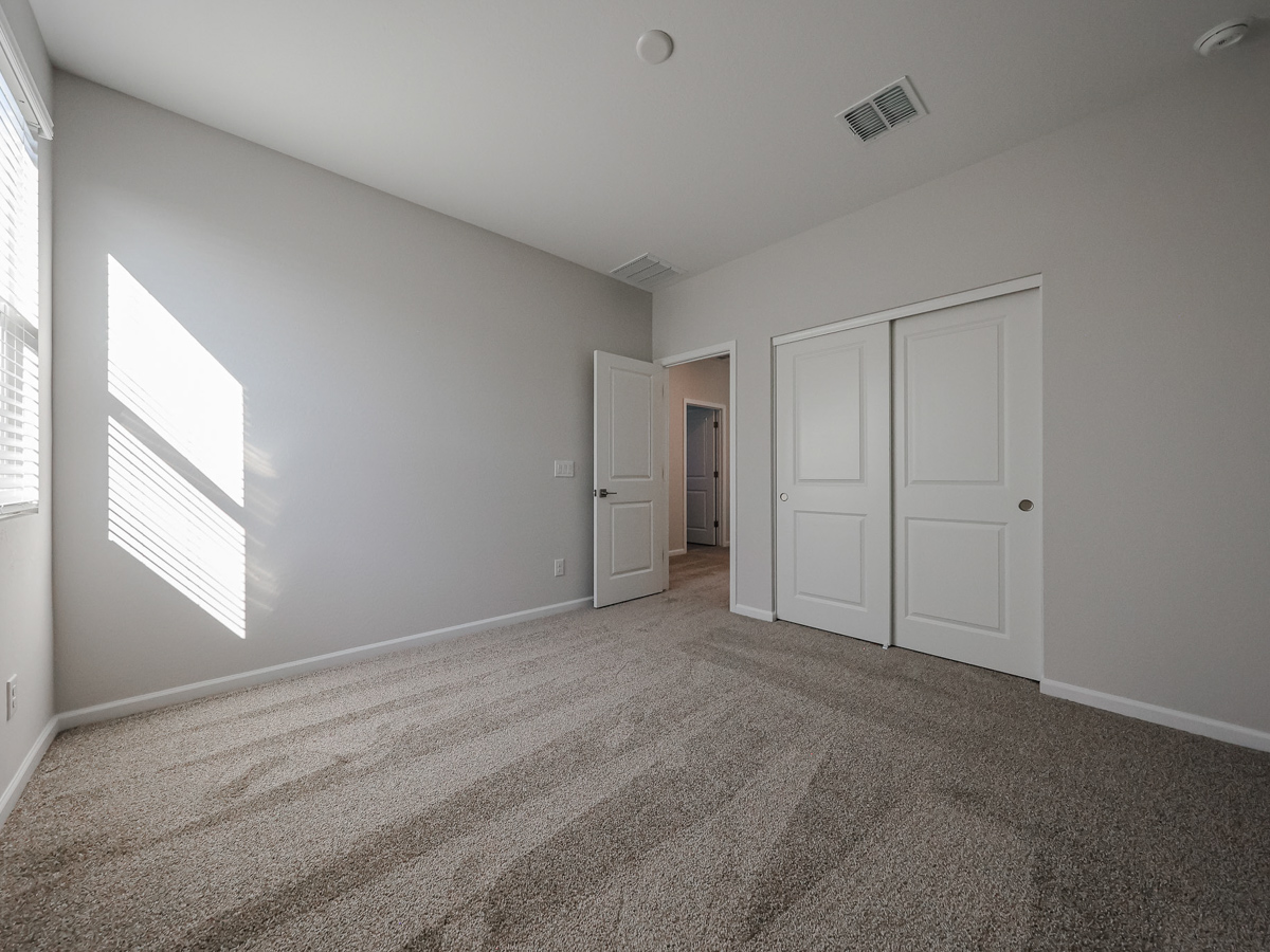 A room with white doors.