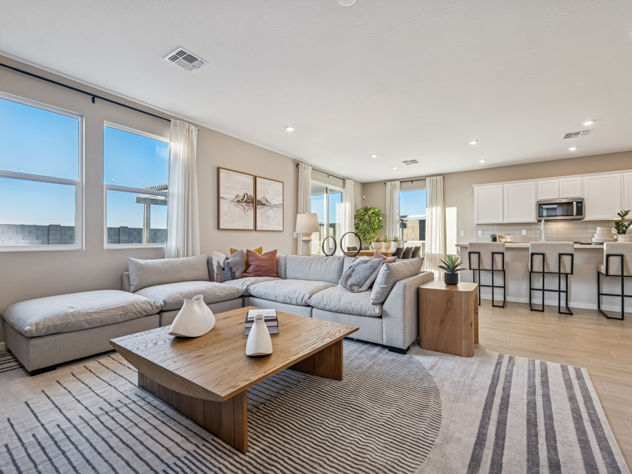 A living room with a couch and a coffee table.