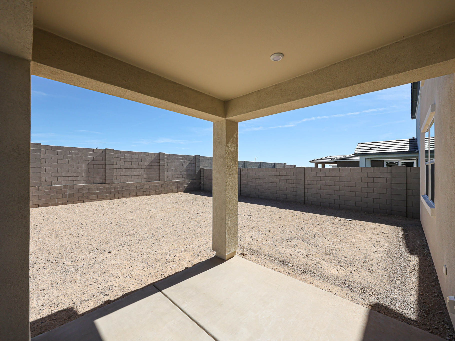 A building with a stone wall.