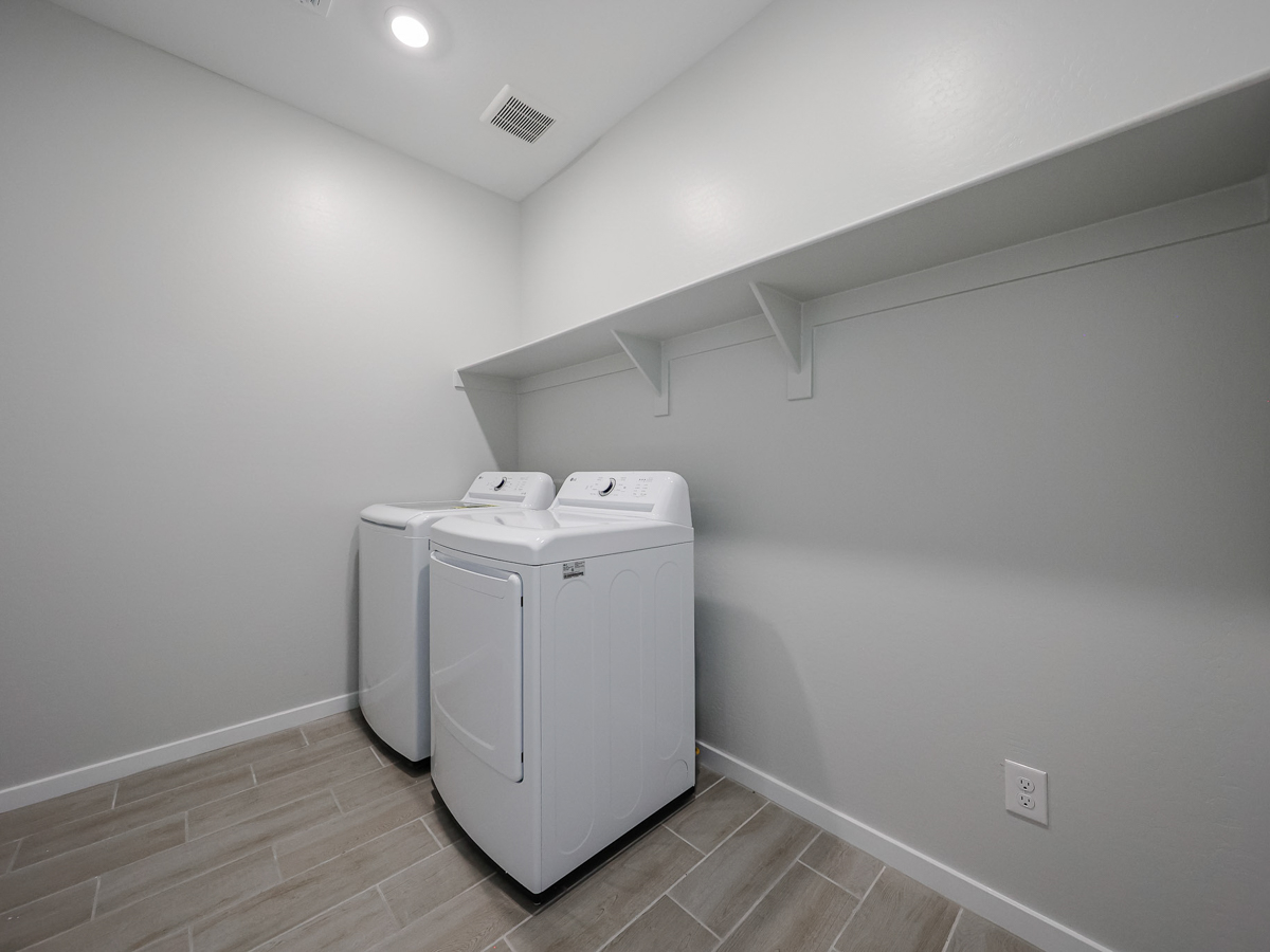 A white machine in a room.