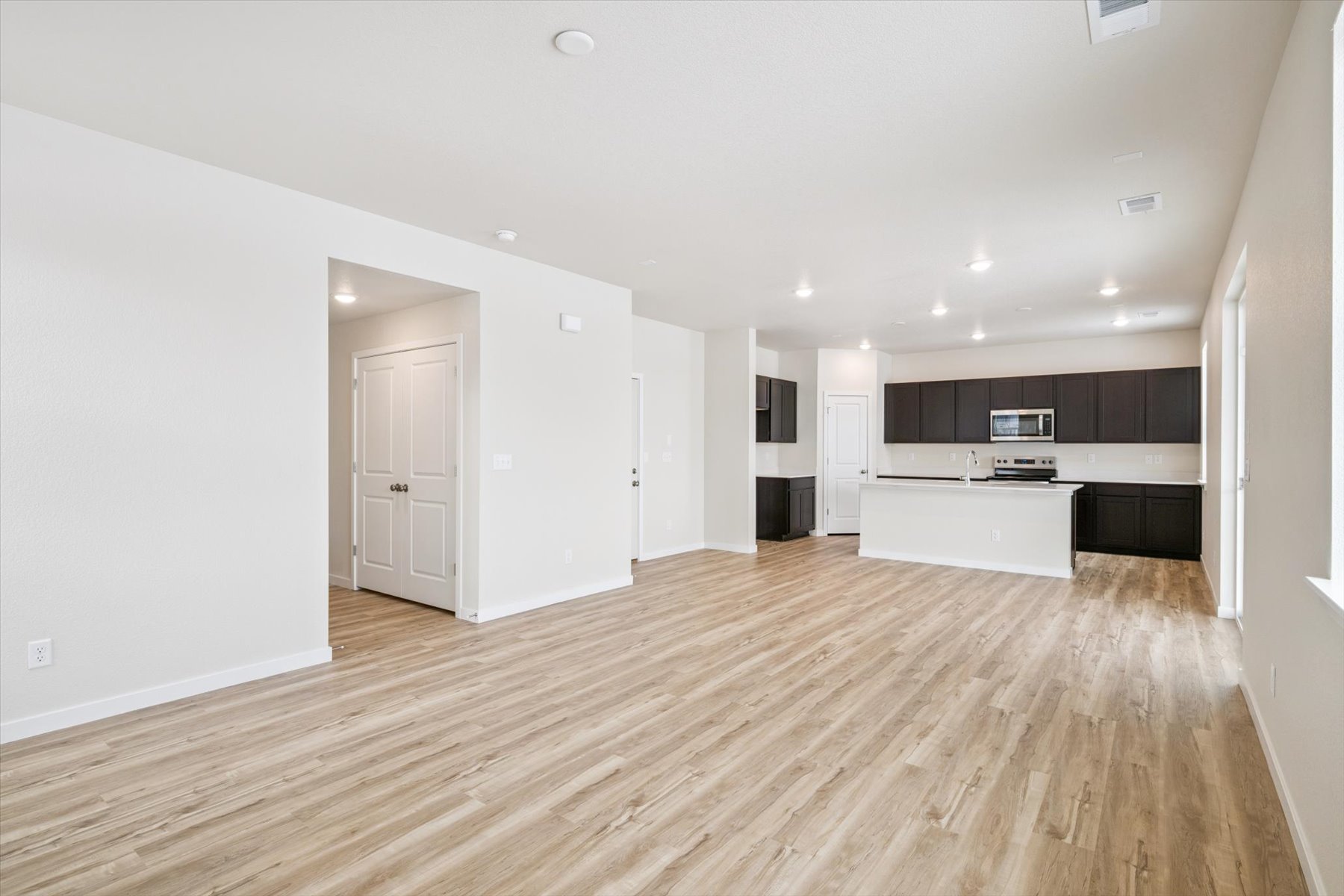 A large empty living room.