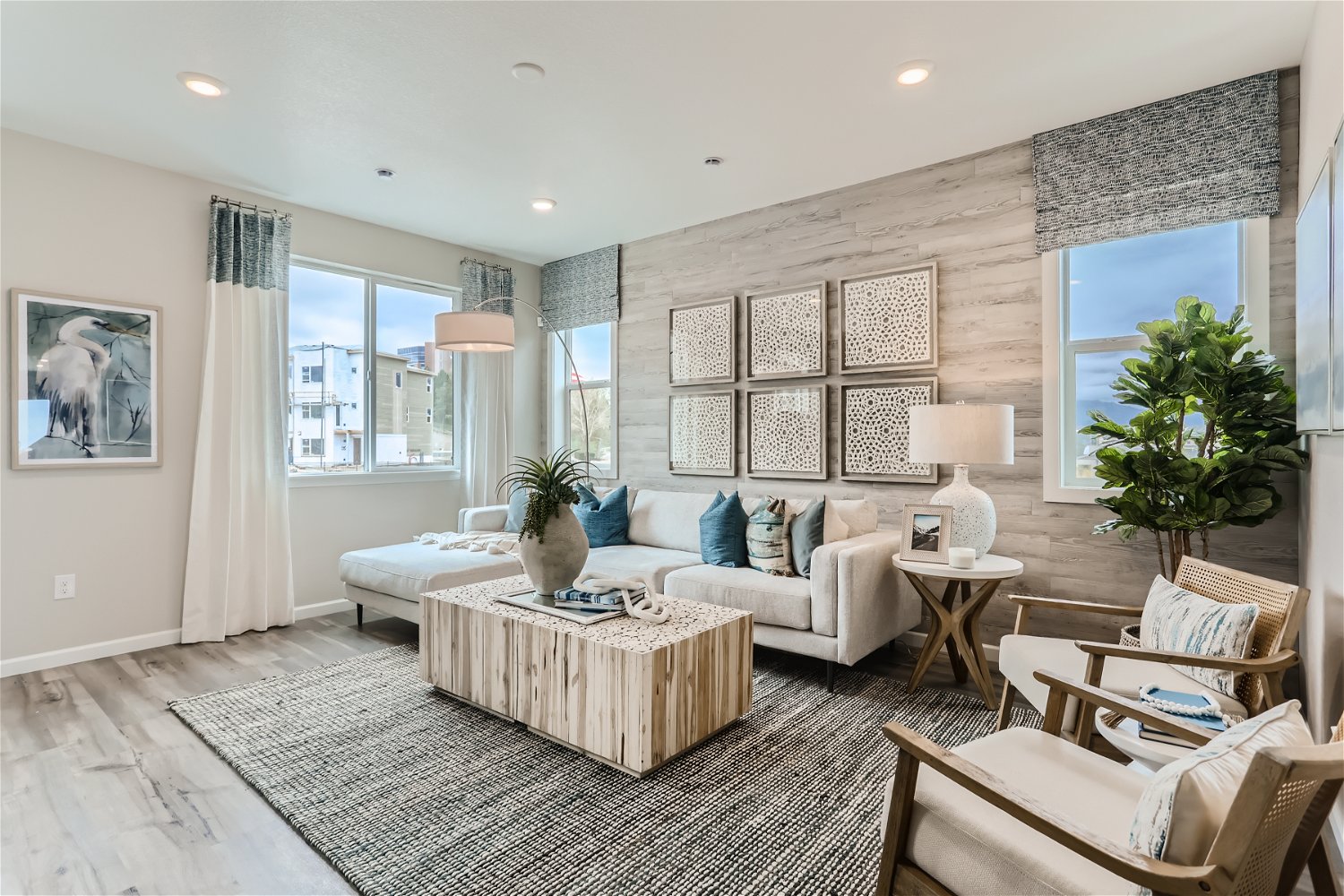 A living room with a couch and a table.