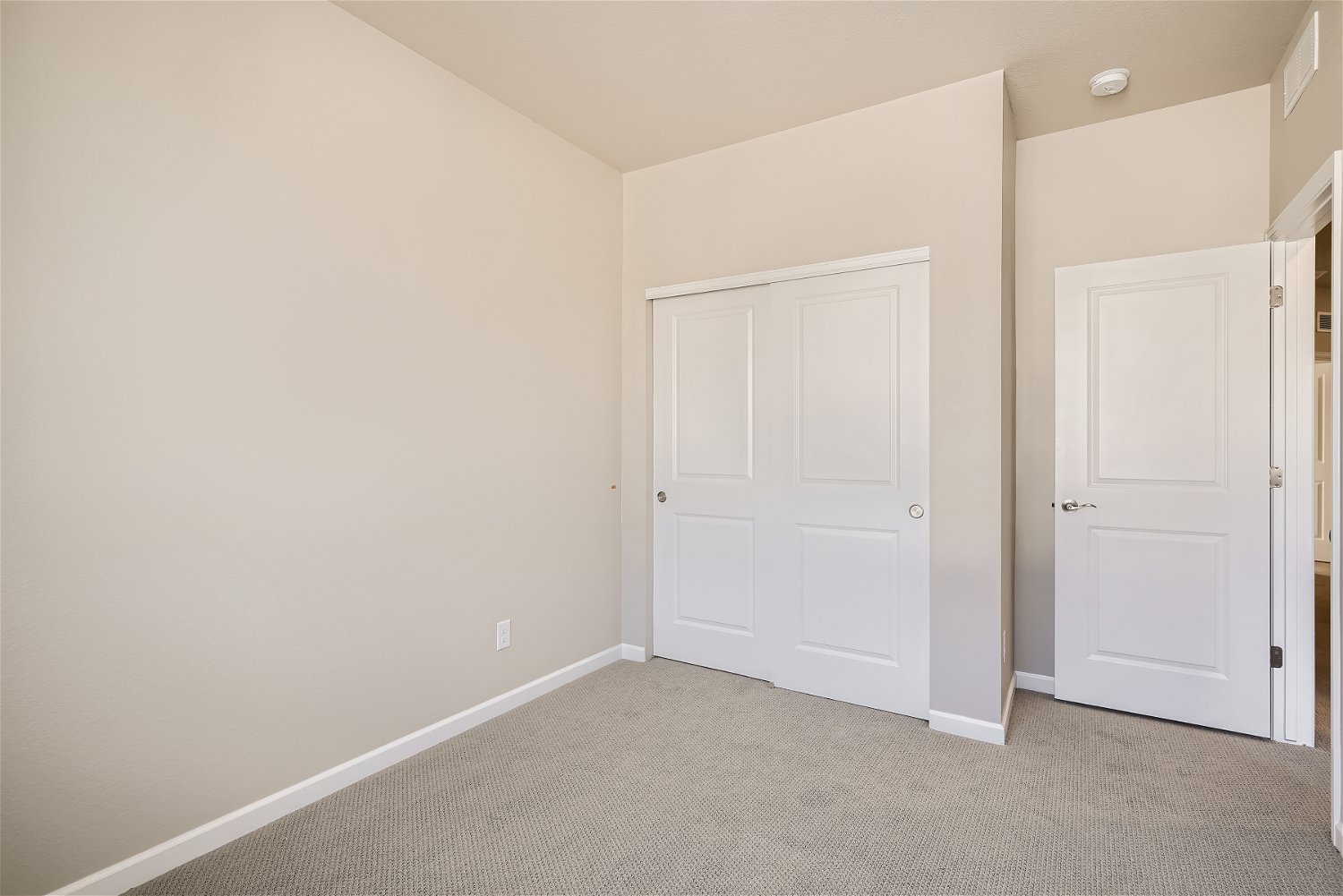A room with white doors.