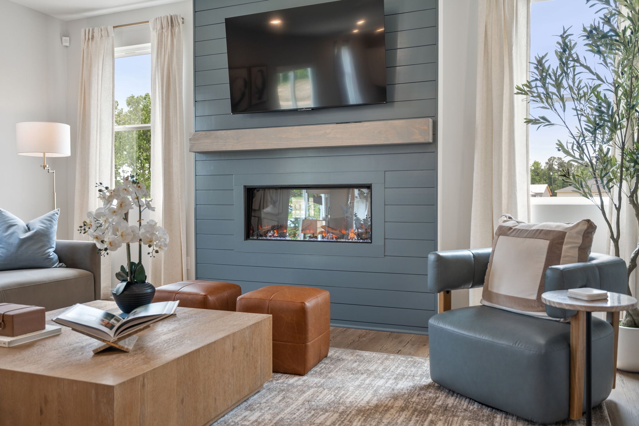 A living room with a fireplace.
