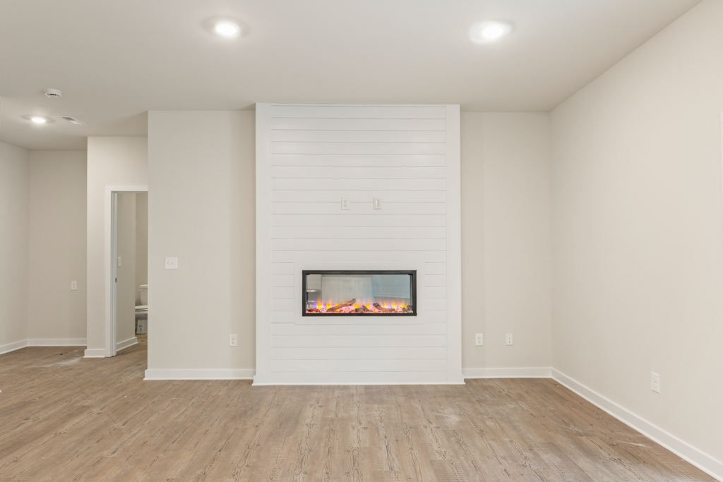 A fireplace in a room.