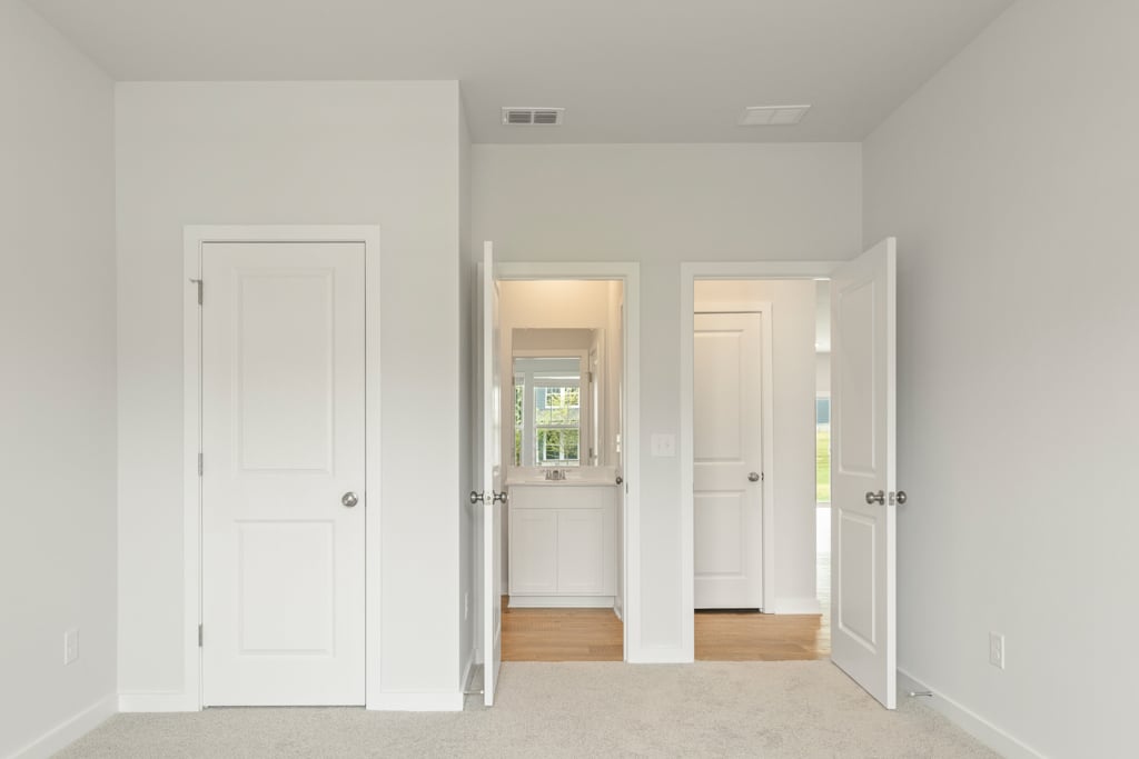 A room with white doors.