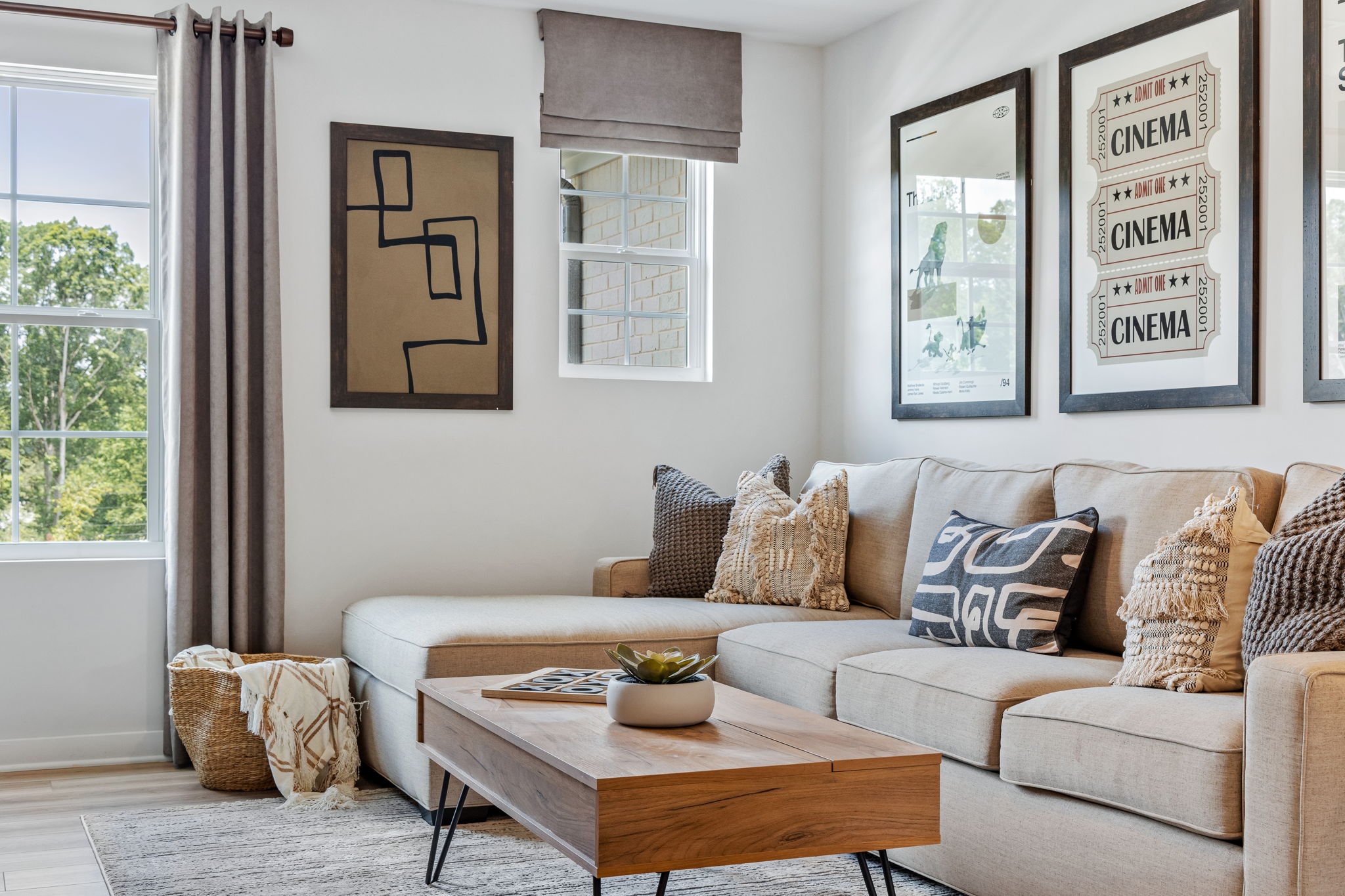 A living room with a couch and coffee table.