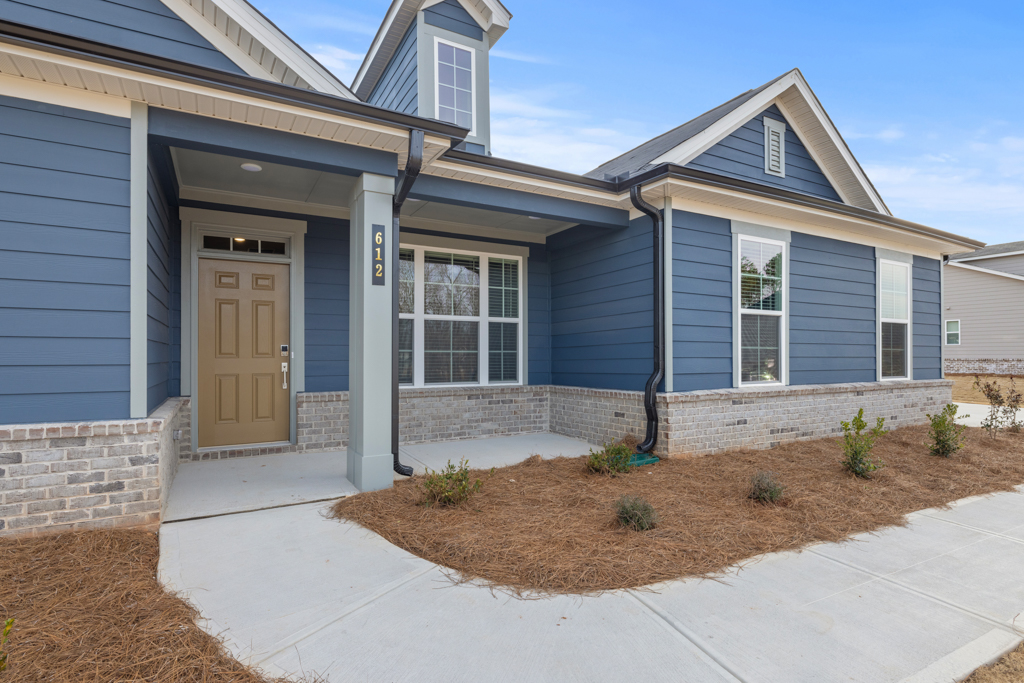 A house with a front yard.