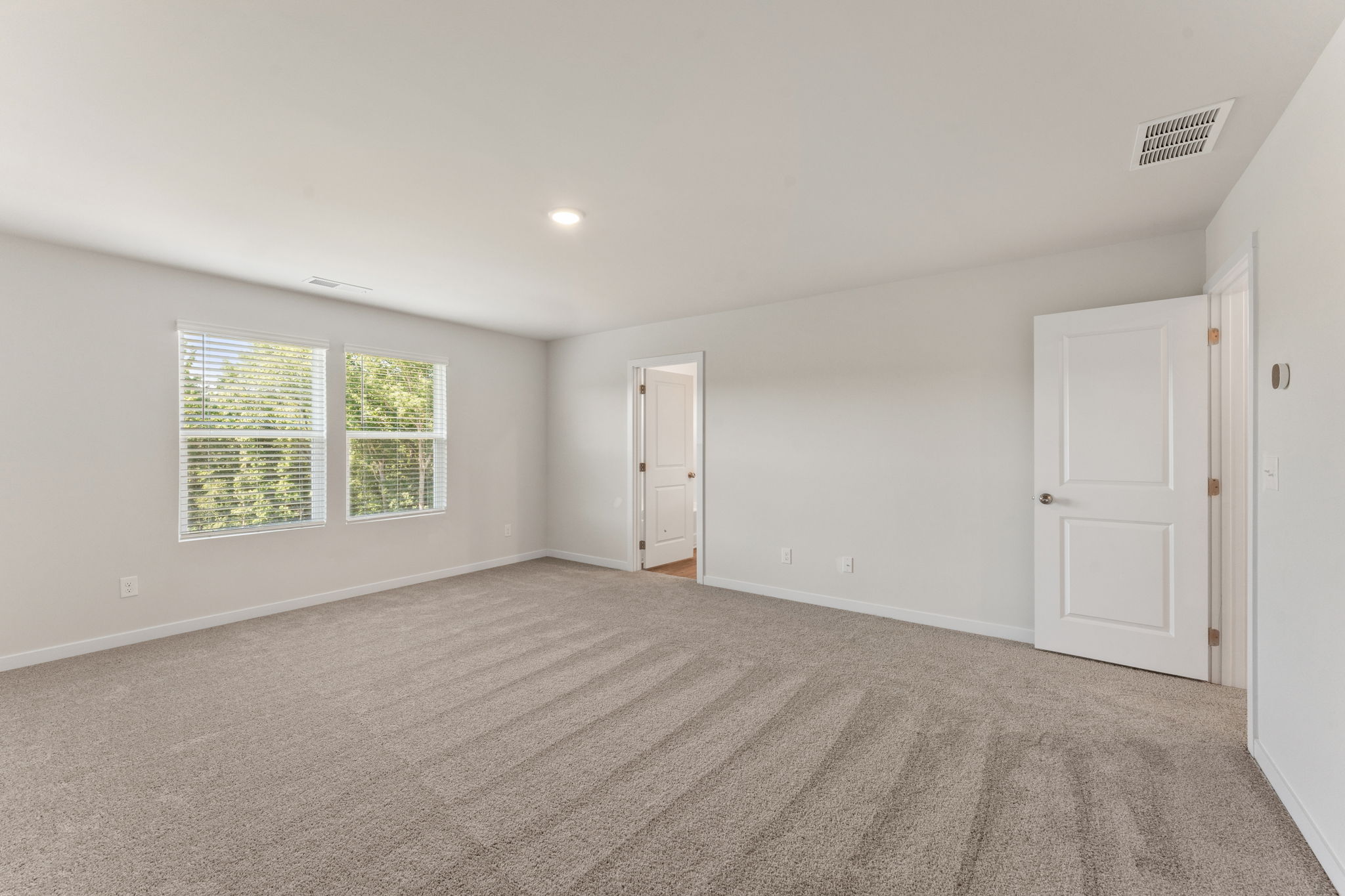 A room with white doors.