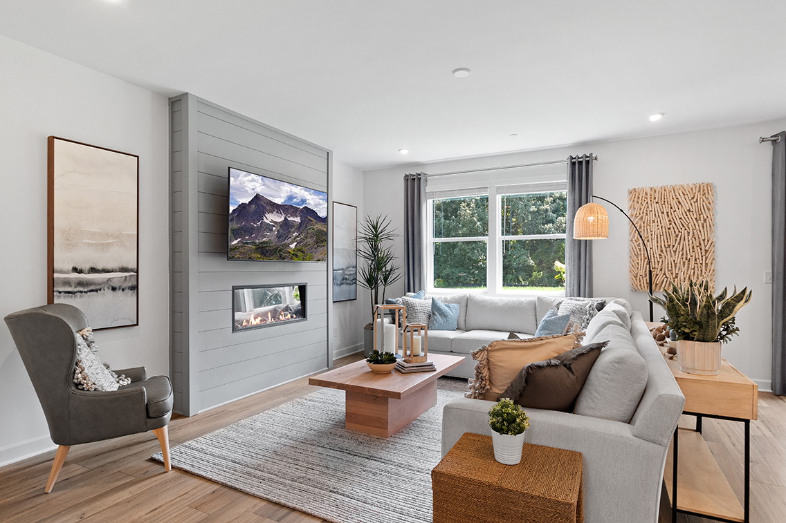 A living room with a couch and a coffee table.