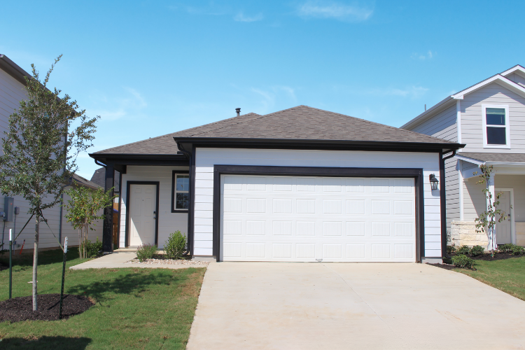 A one-story house with a garage.