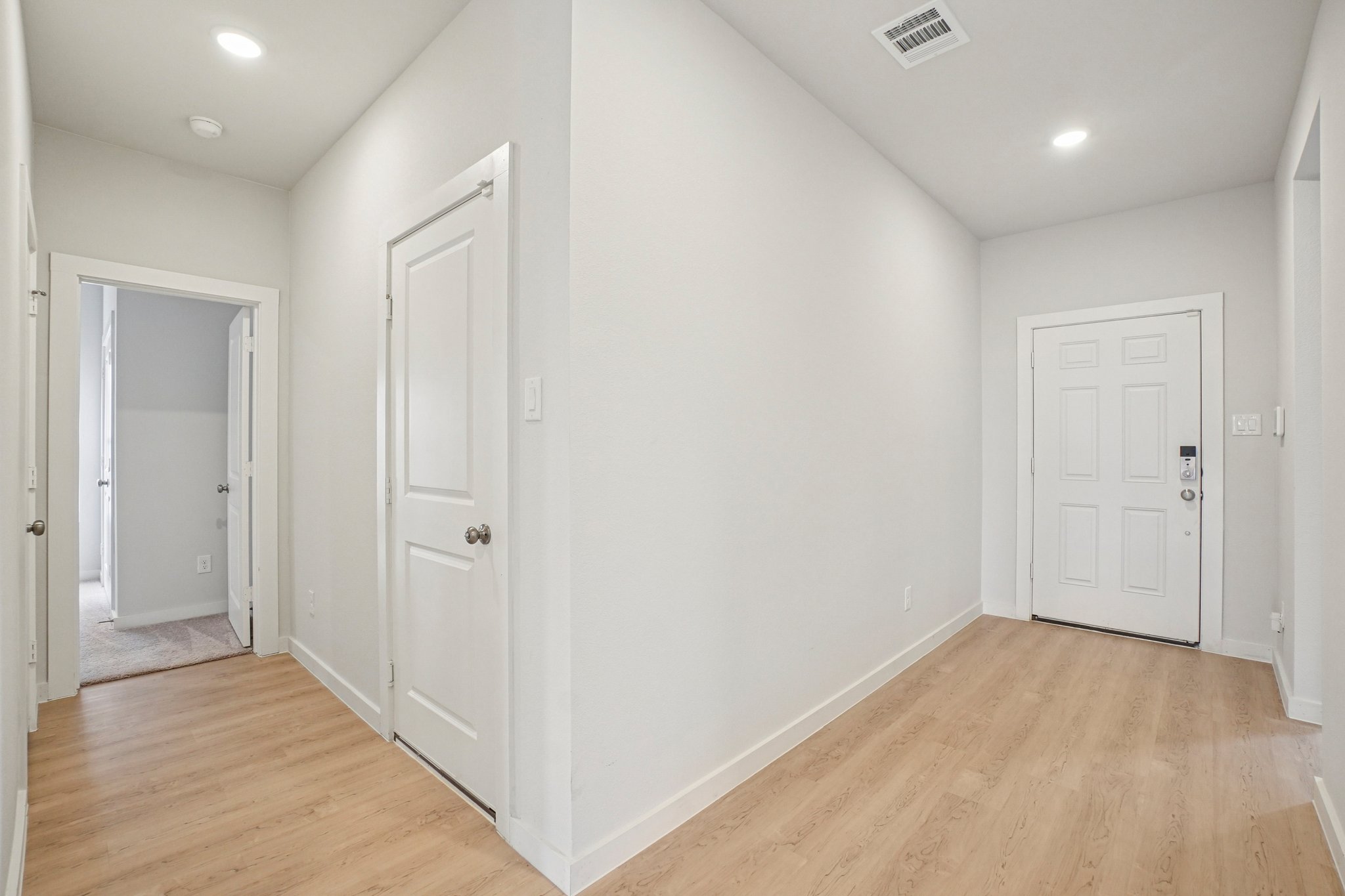 A room with white doors.
