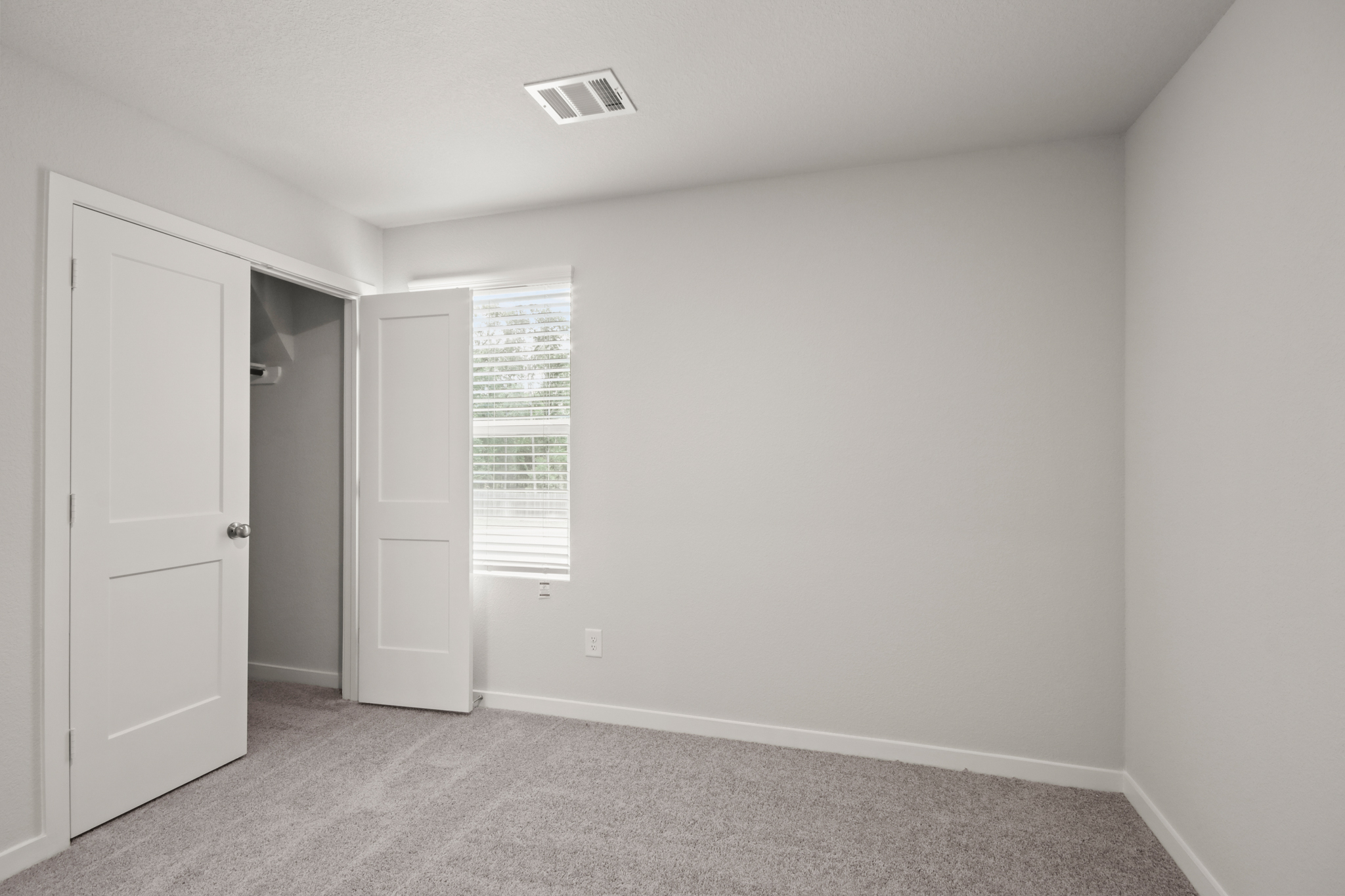 A room with white doors.