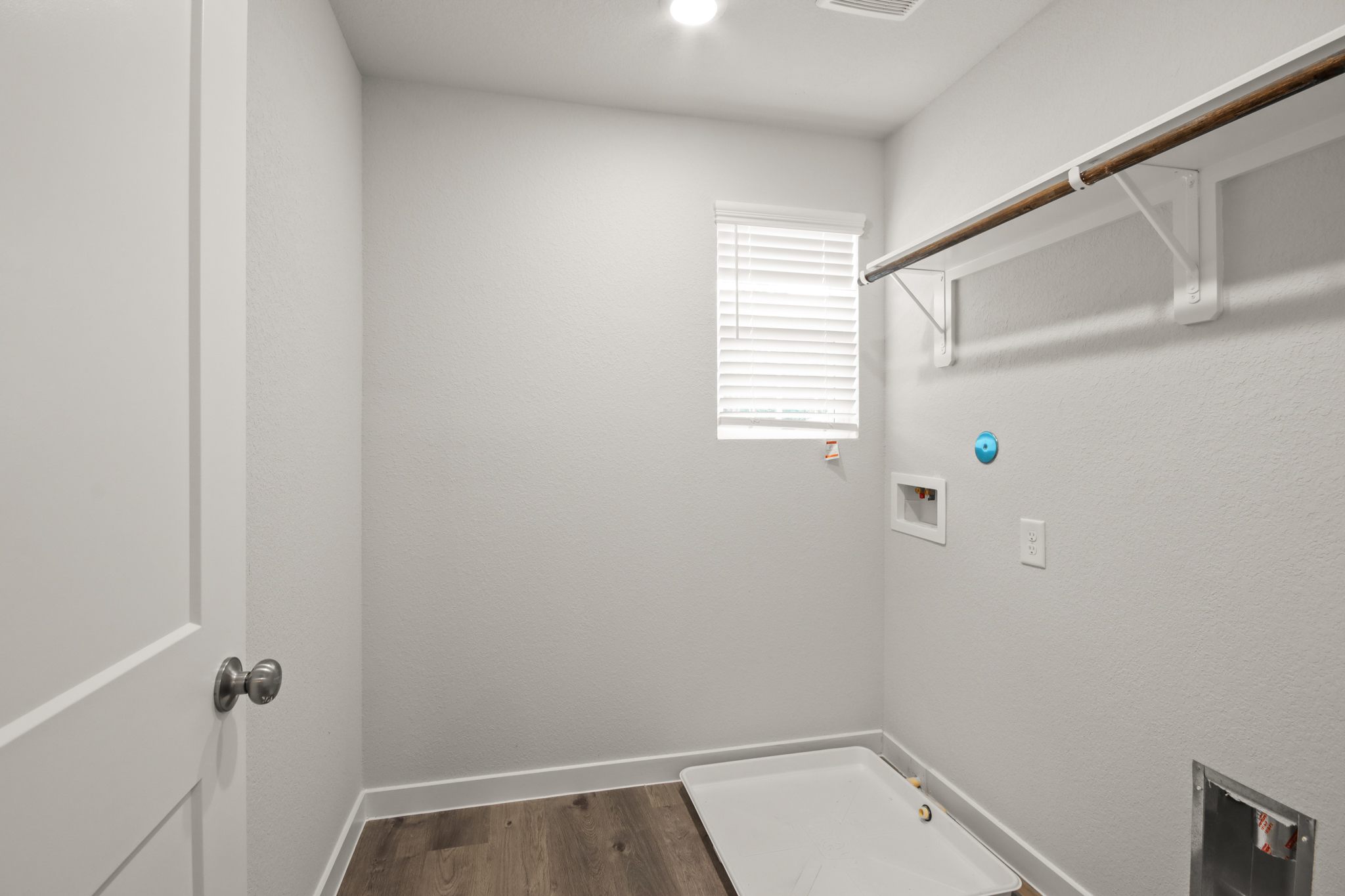 A bathroom with a bathtub and shower.