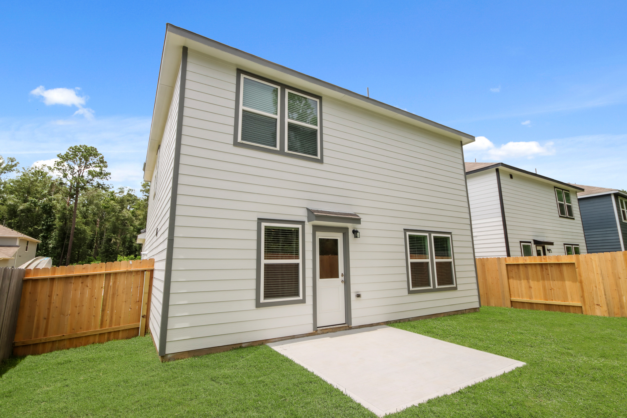 A house with a fence around it.
