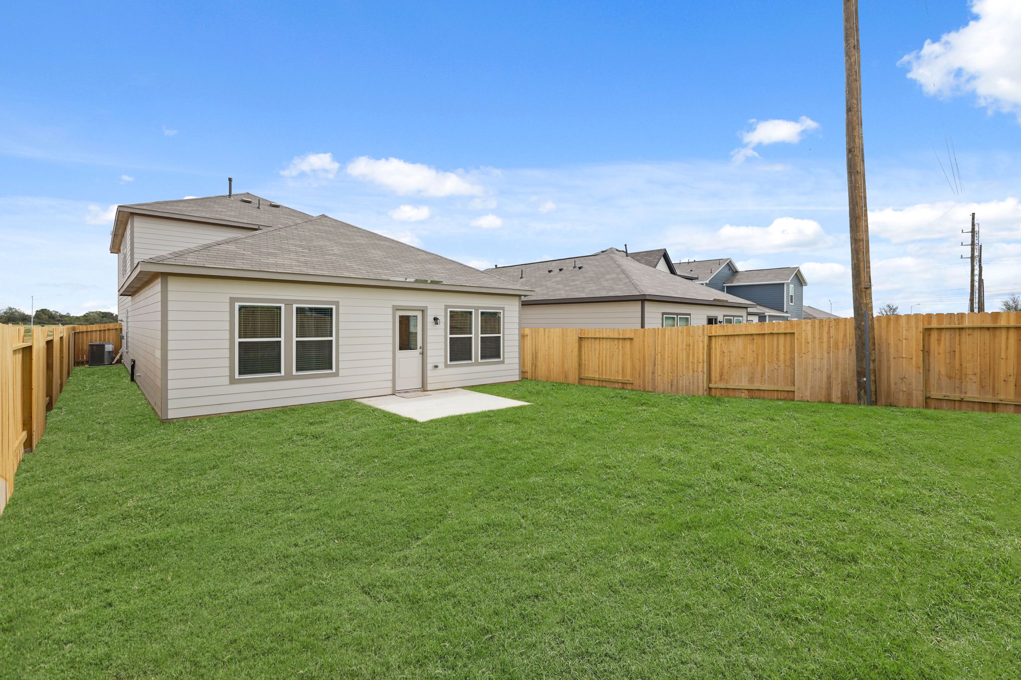 A house with a fence around it.