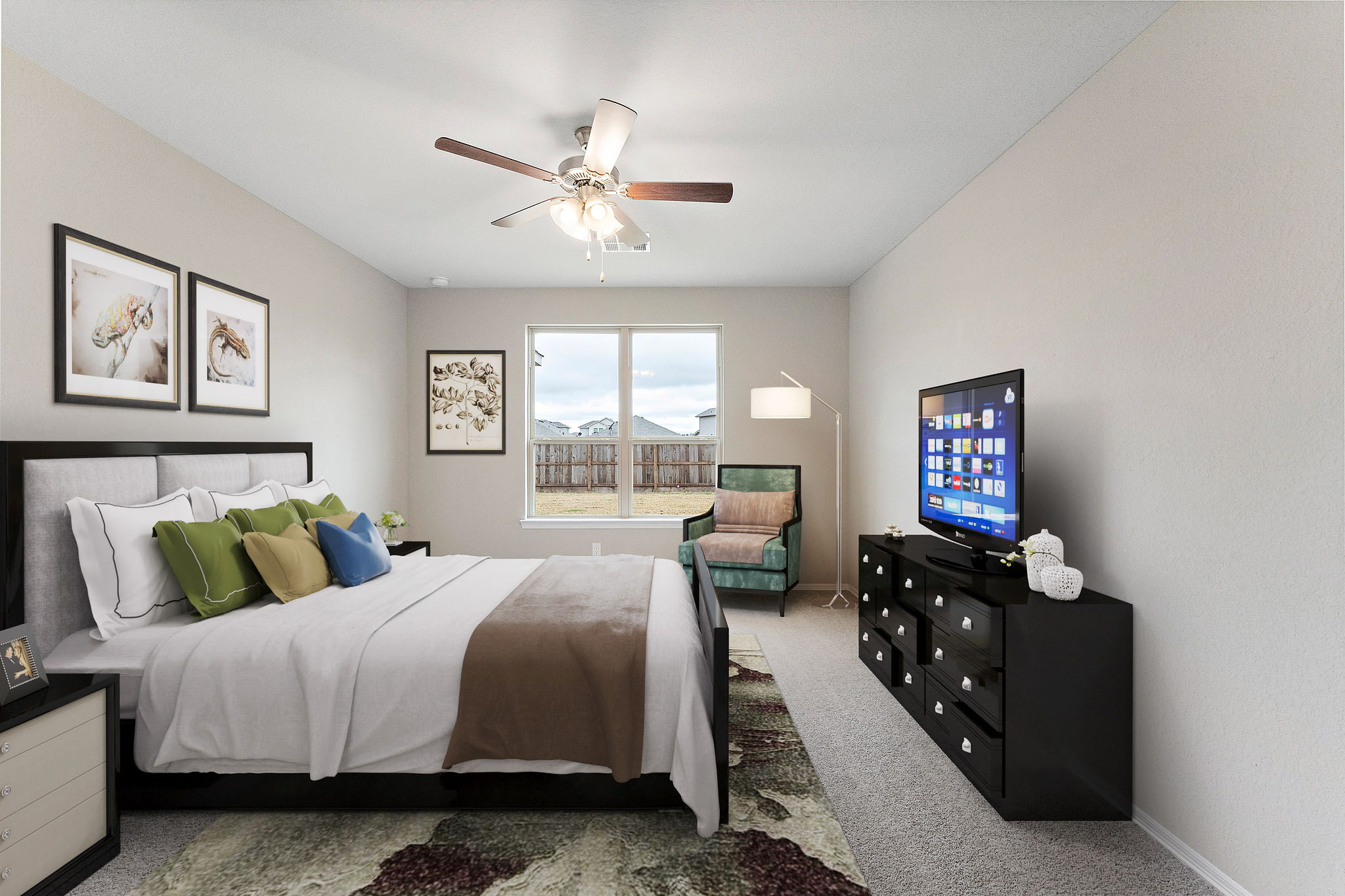 A bedroom with a large window.