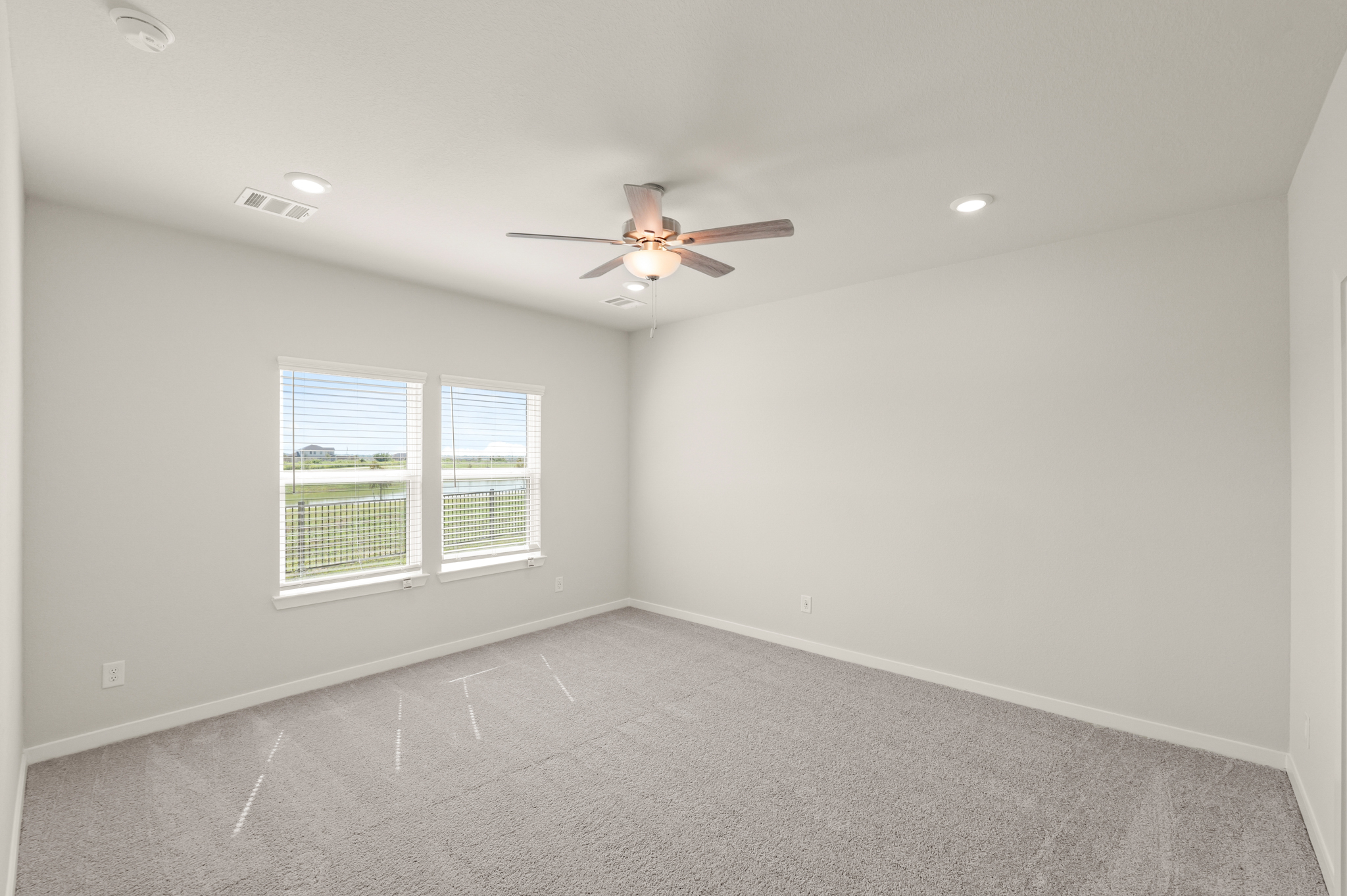 A ceiling fan in a room.