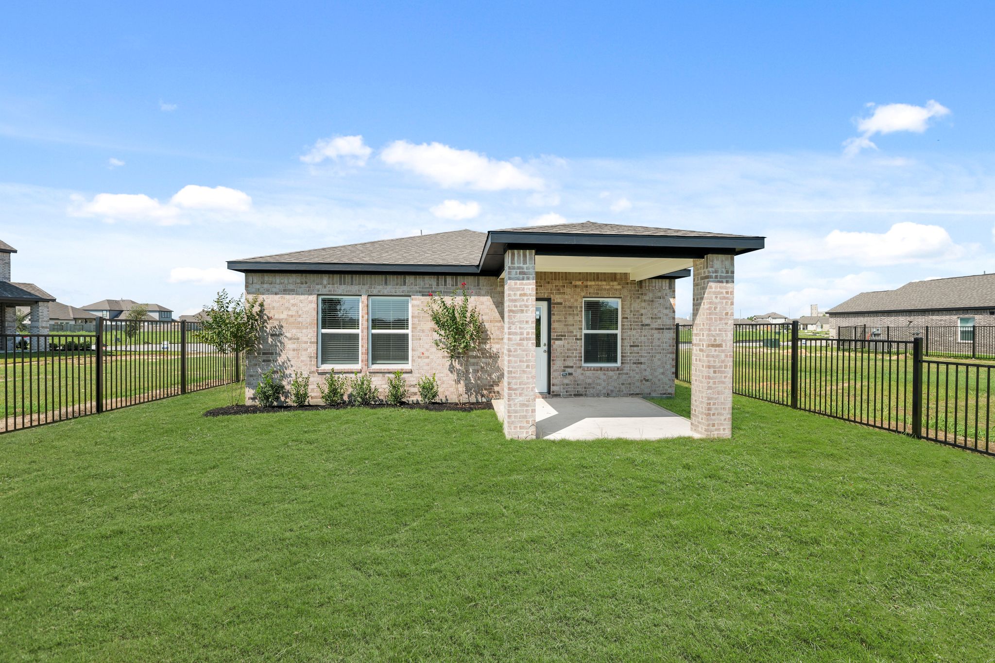 A house with a fence around it.
