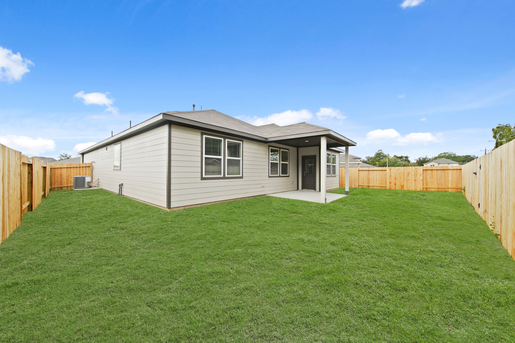 A house with a fence around it.