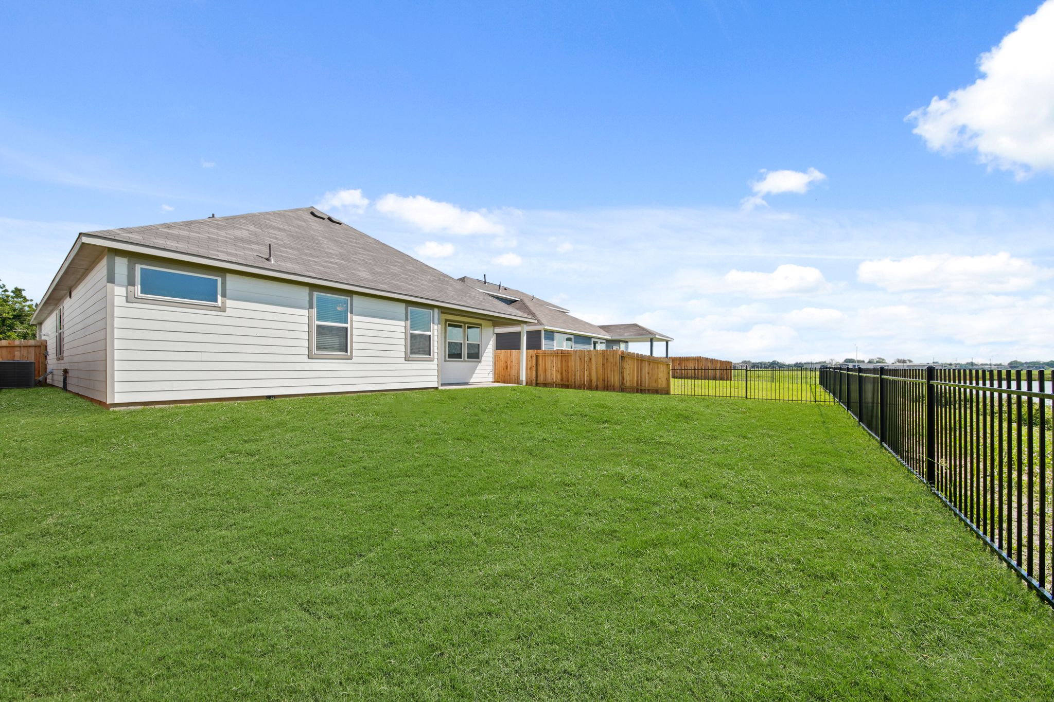 A house with a fence around it.