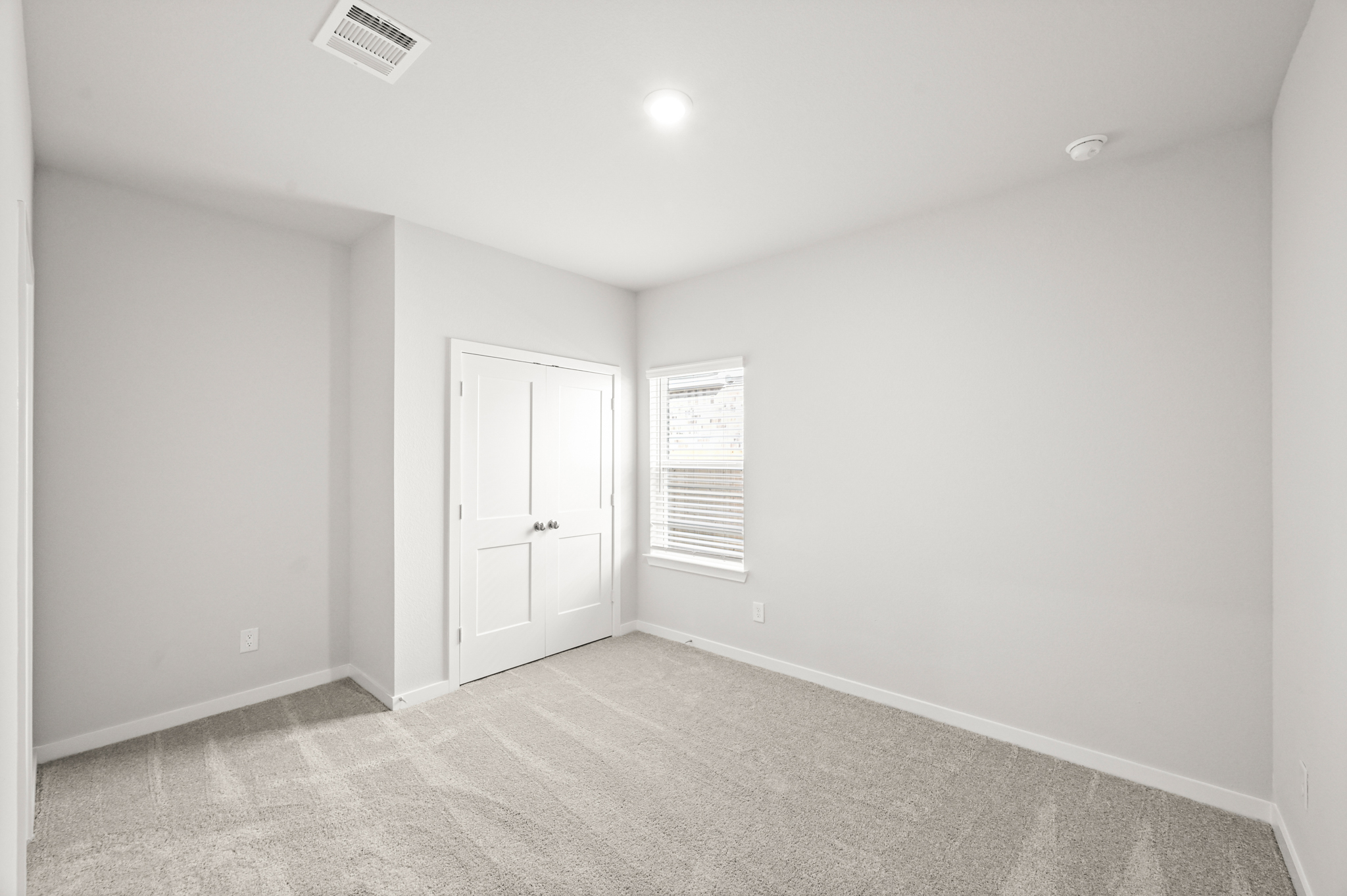 A room with white doors.