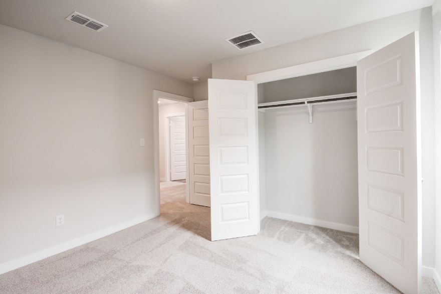 A room with white doors.