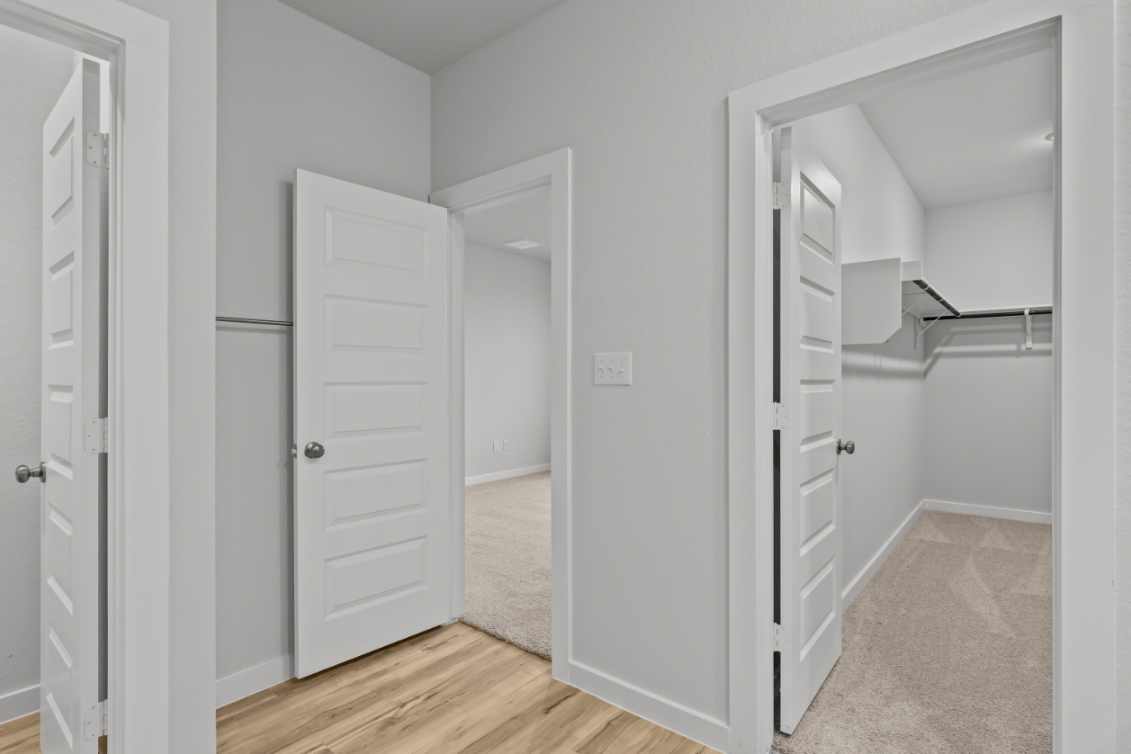 A room with white doors.