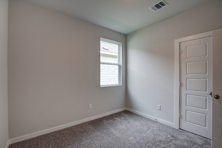 A room with white doors.