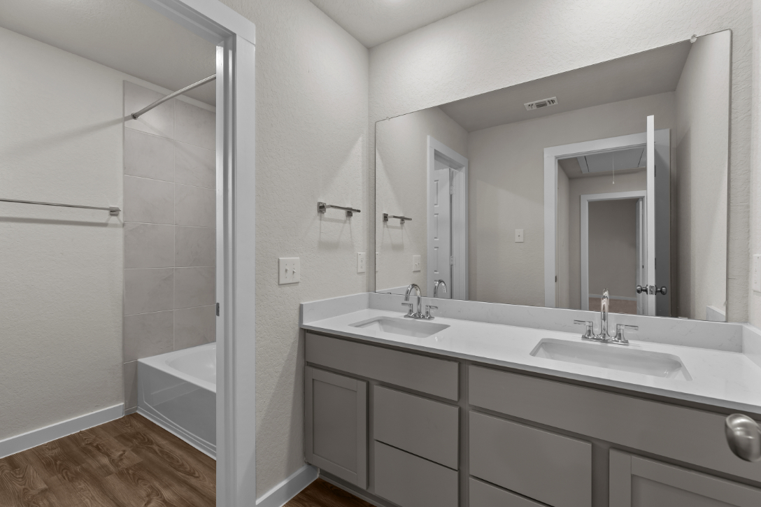 A bathroom with a glass shower.