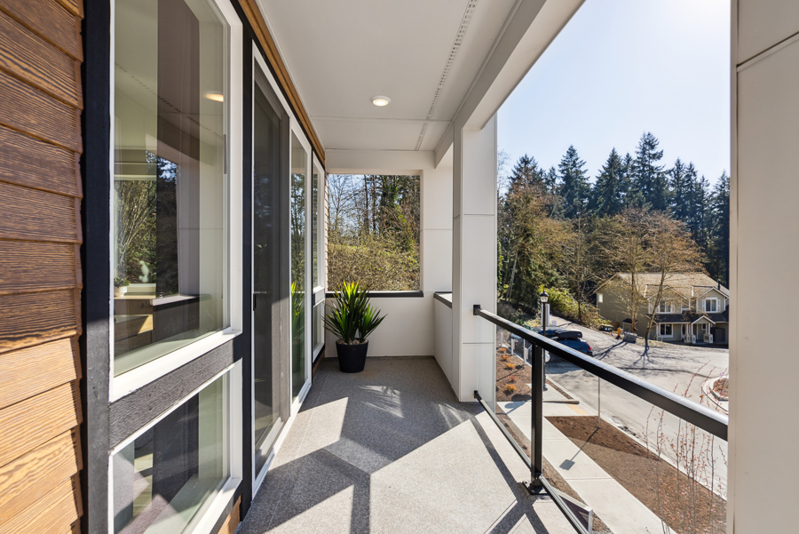 A house with a glass front porch.