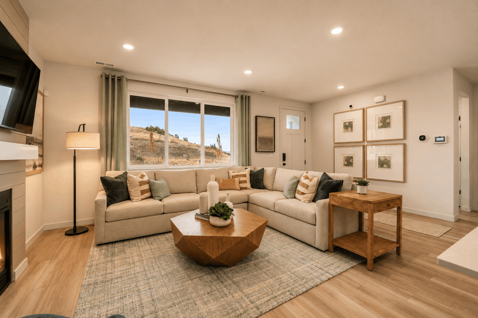 A living room with a large window.