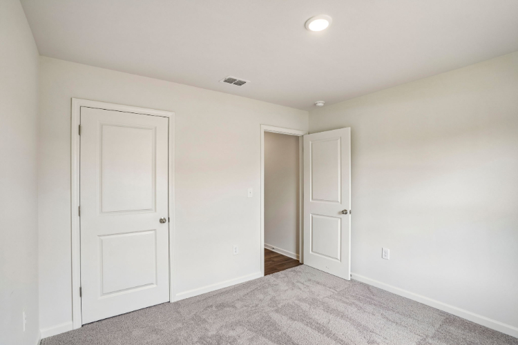 A room with white doors.