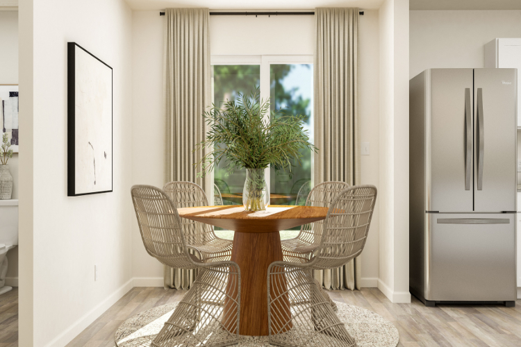 A dining room table with chairs.