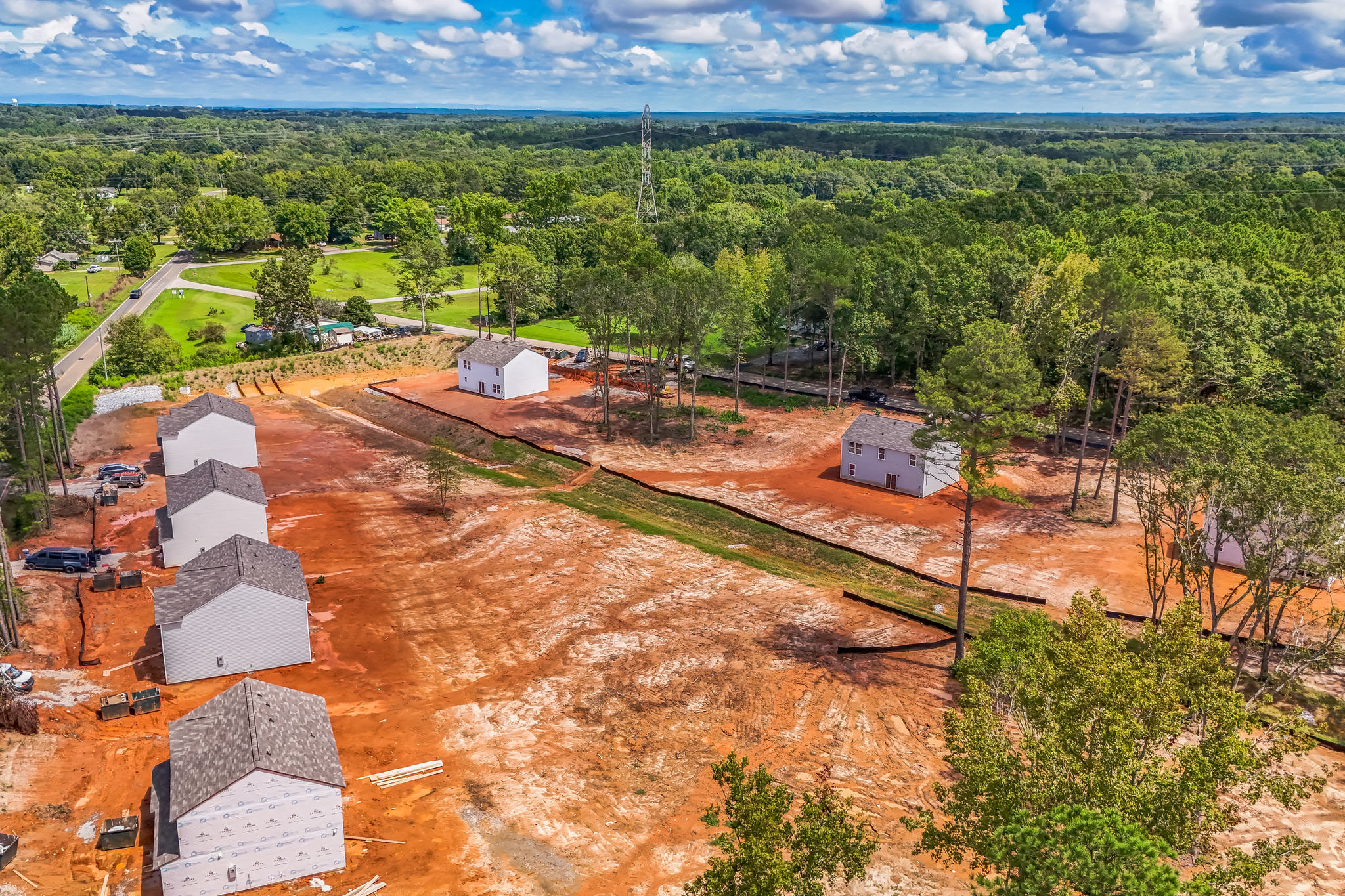 A landscape with trees and buildings.