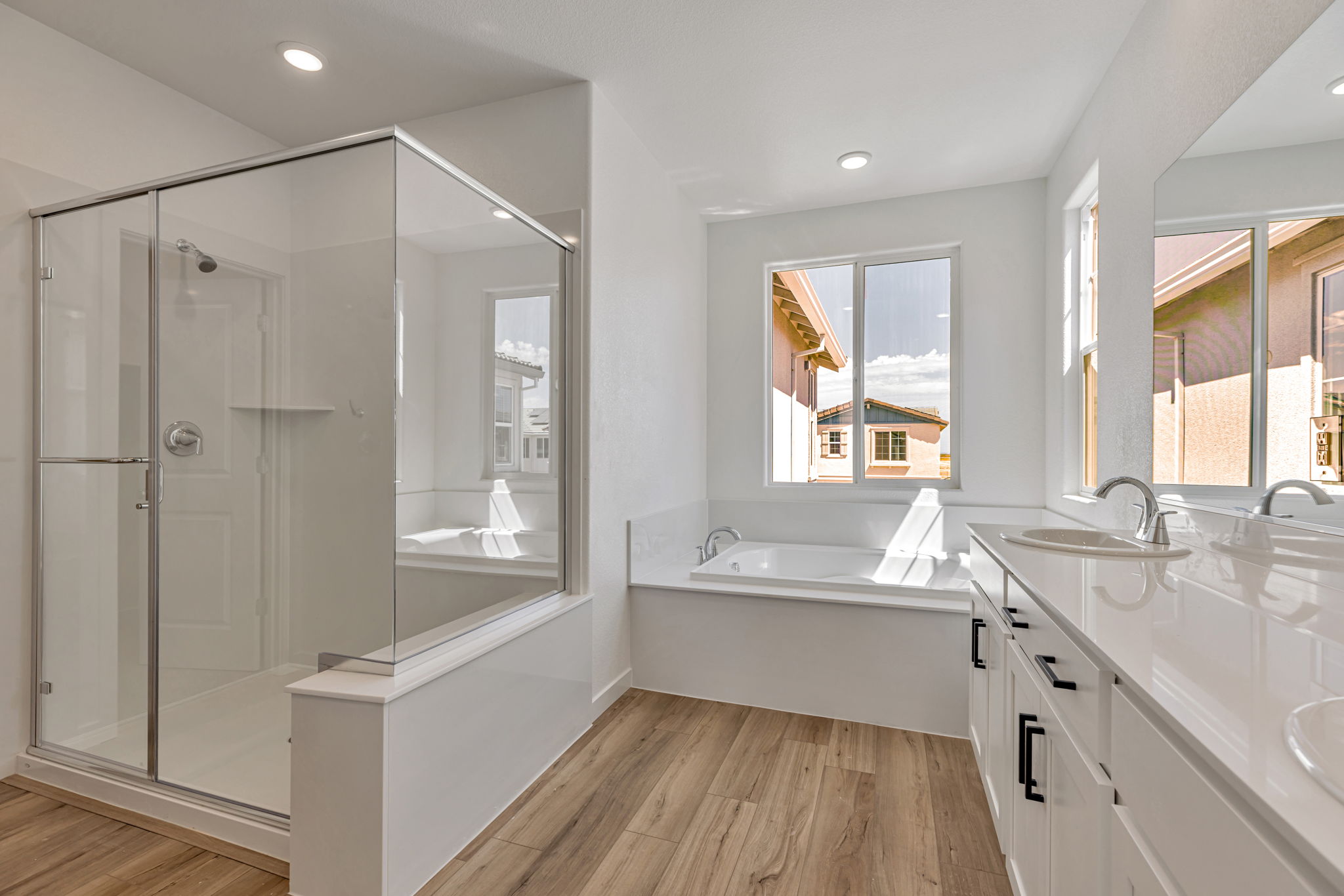 A bathroom with a glass shower.